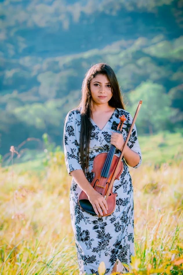 Outdoor portrait of a woman in a blue patterned dress